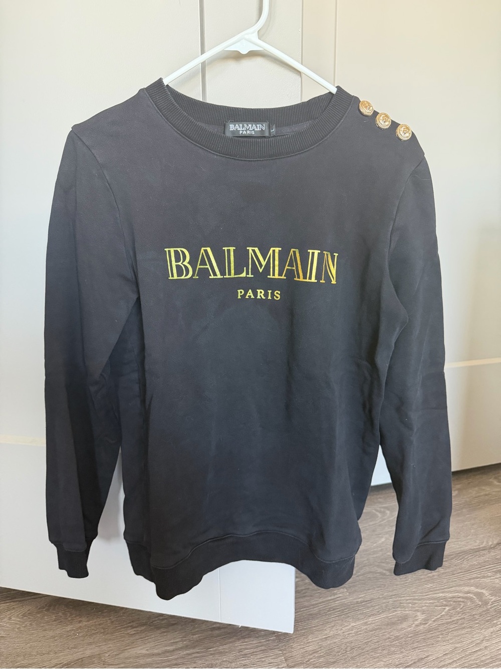 Balmain Black Crewneck Sweater with Yellow Logo and Gold Buttons